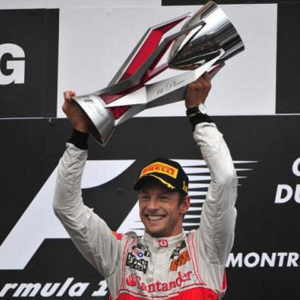 Jenson Button holding the Canadian Grand Prix Trophy