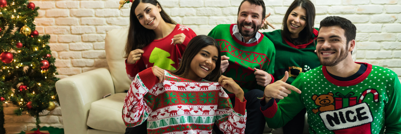 Employees engaging in an ungly sweater contest