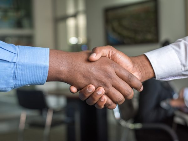 Two people shaking hands