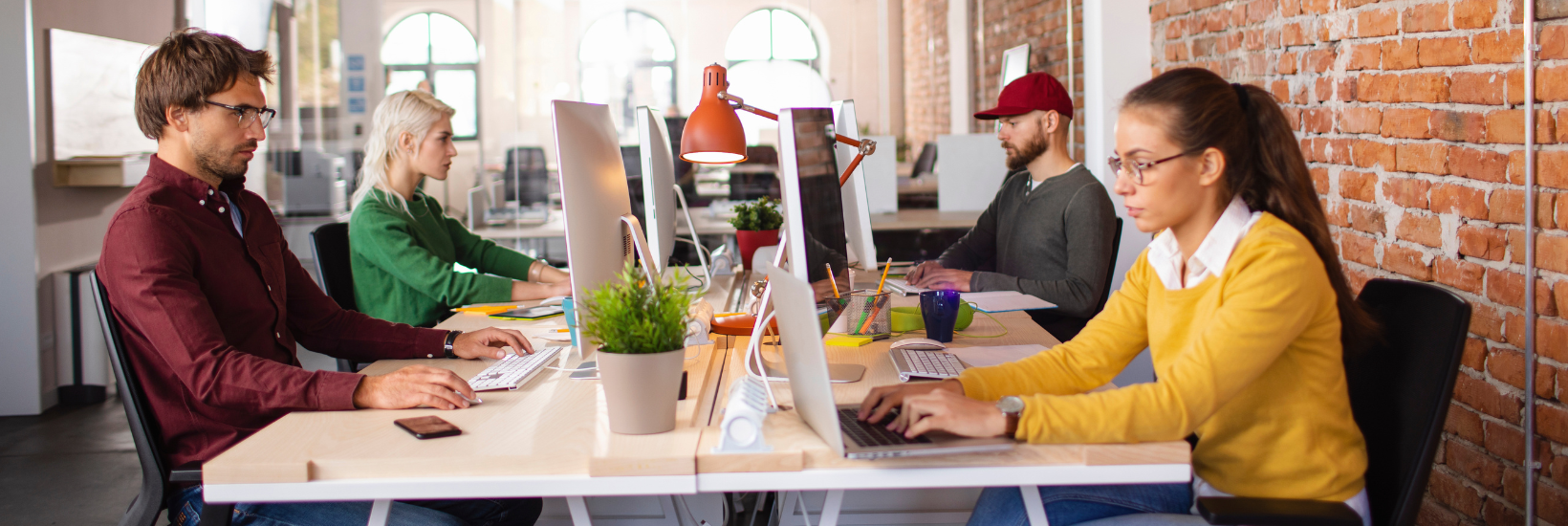 Employees working in a positive work environment