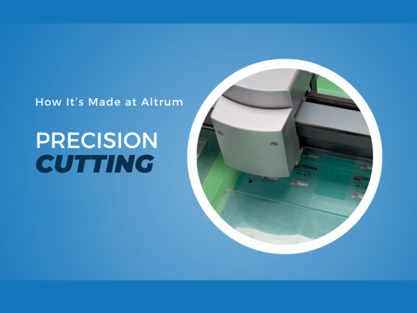 Precision cutting equipment shaping a custom award component, highlighting Altrum's advanced manufacturing capabilities.