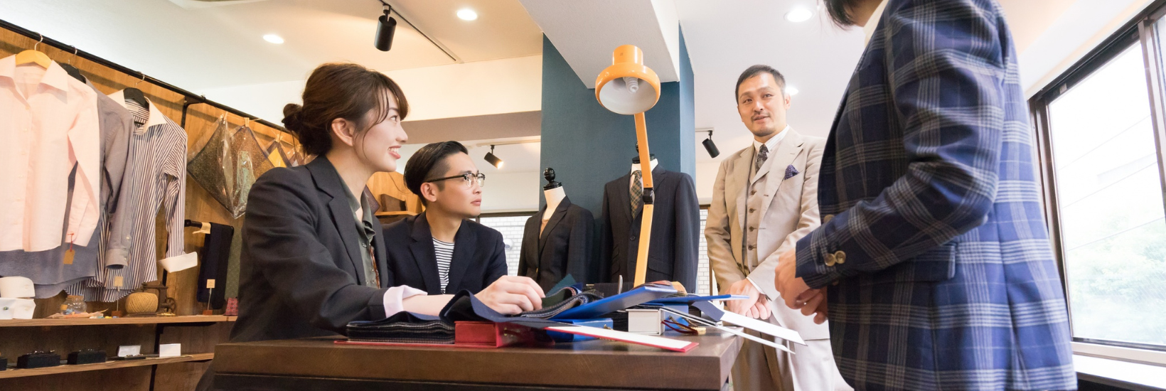 Employees working in a tailor shop