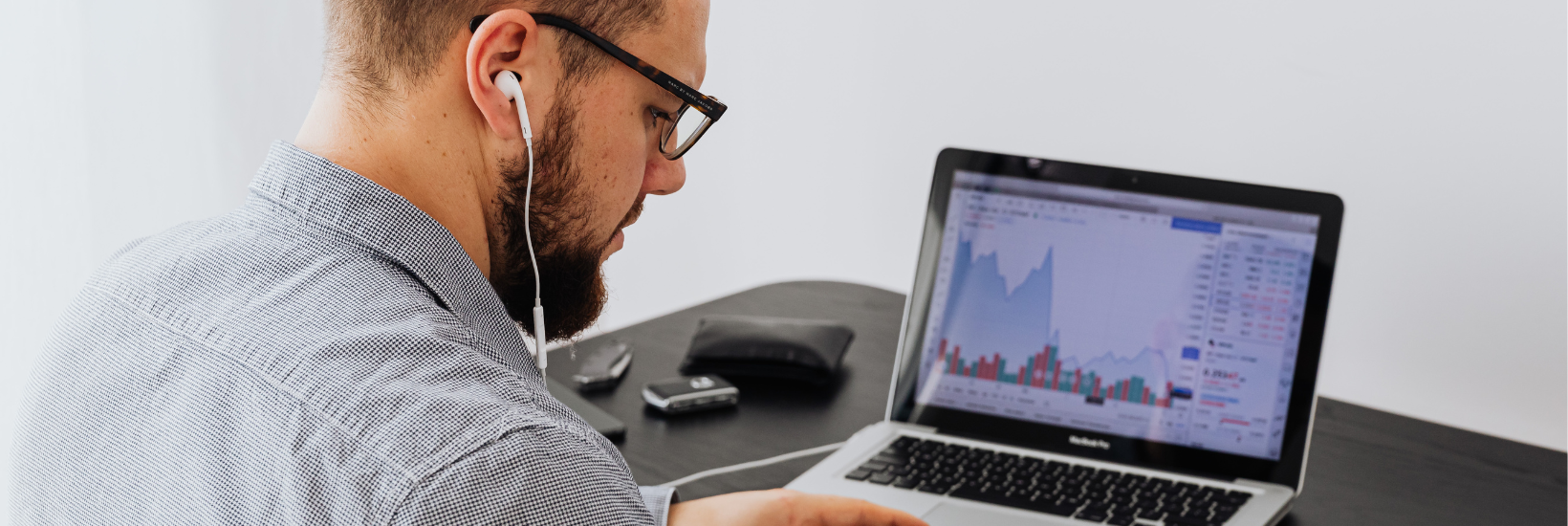 HR professional analyzing his employee recognition program