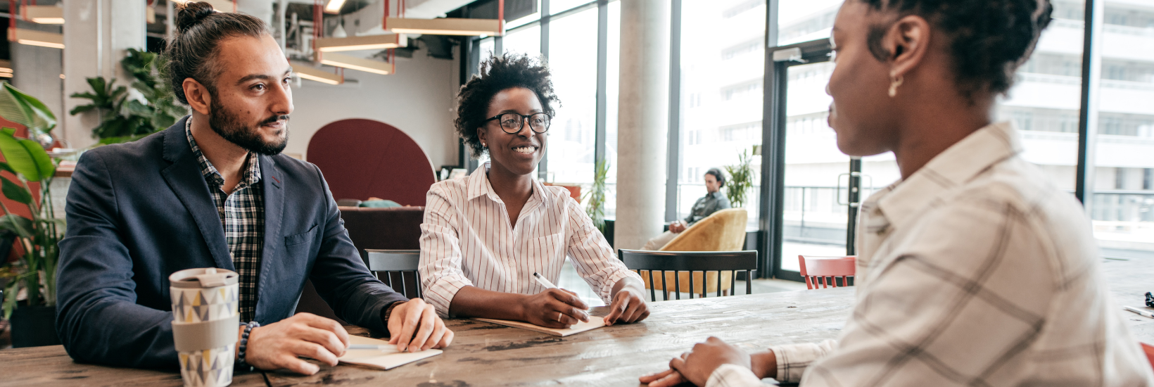 Managers interviewing an employee for their store