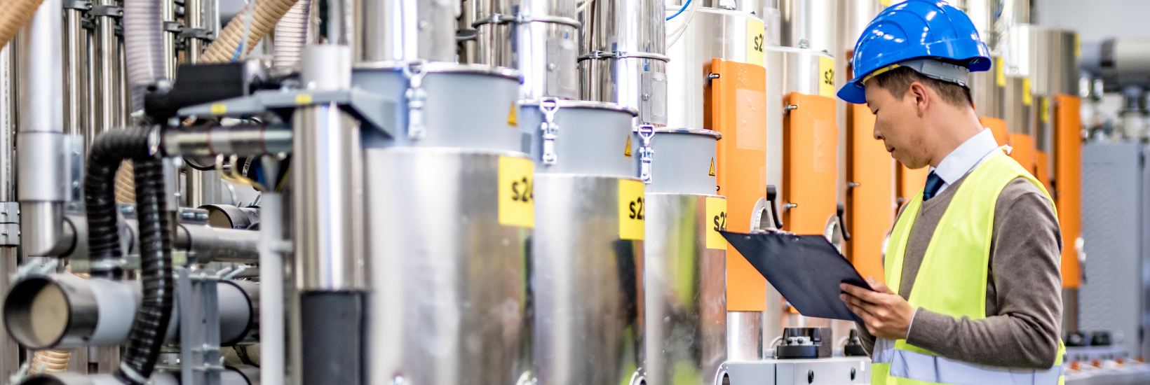 Employee doing verification in manufacturing