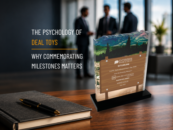 Investment banking executives in discussion within a modern office environment, representing achievement recognition, milestone celebrations, and professional success.